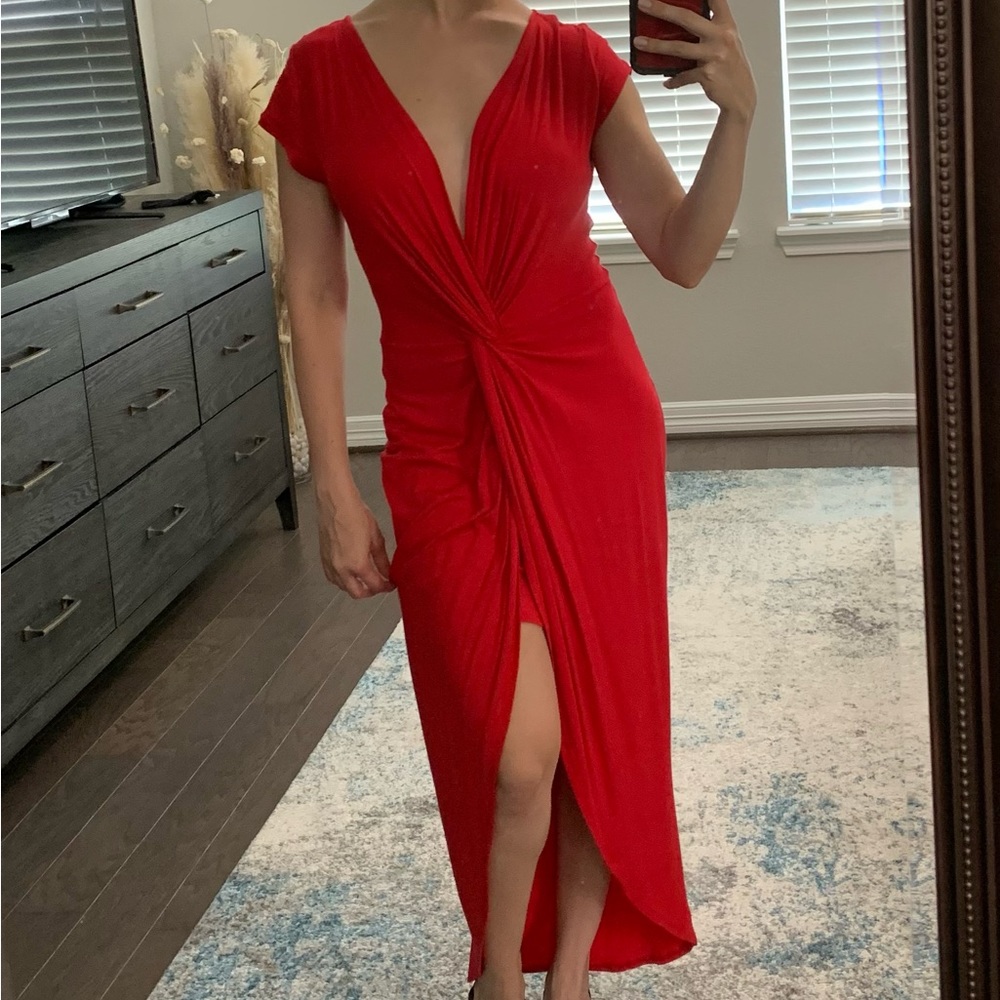 Sexy fitted red dress with a plunging neckline.
